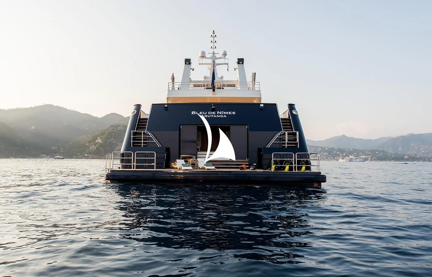 a boat in the water aboard BLEU DE NIMES Yacht for Charter