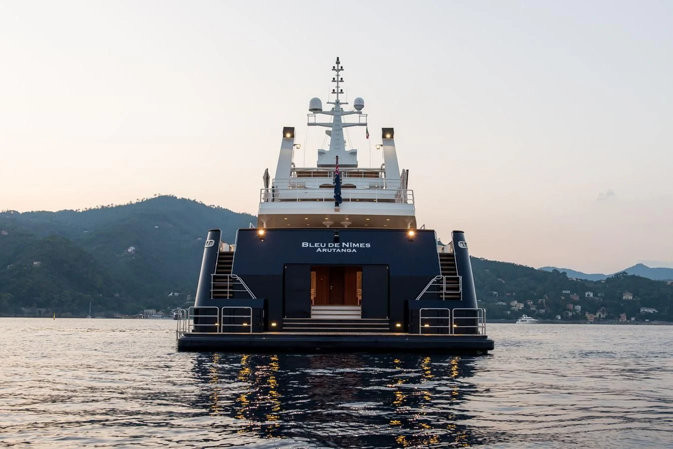 a large ship in the water aboard BLEU DE NIMES Yacht for Charter