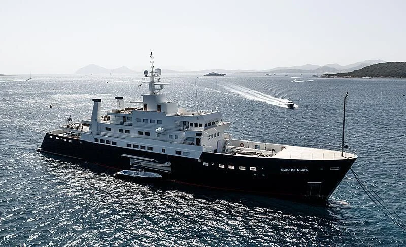 a large ship in the water aboard BLEU DE NIMES Yacht for Charter