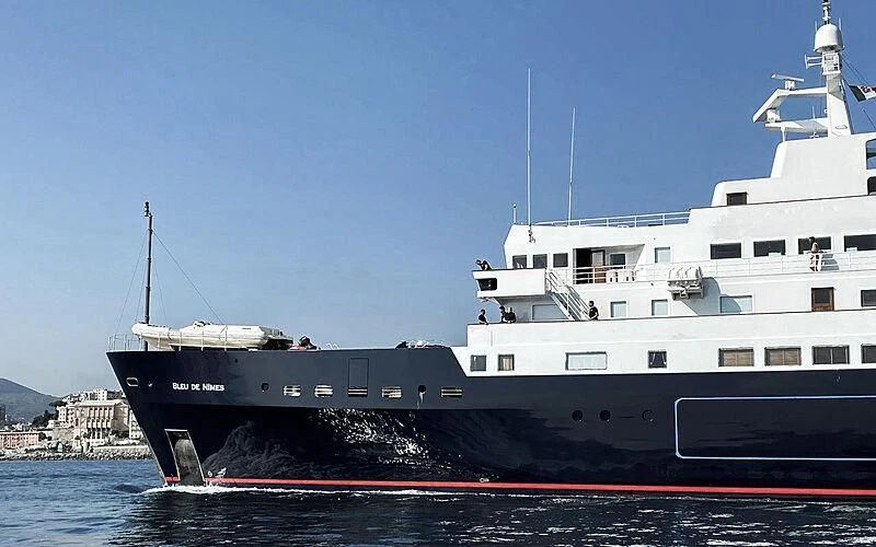 a large ship in the water aboard BLEU DE NIMES Yacht for Charter