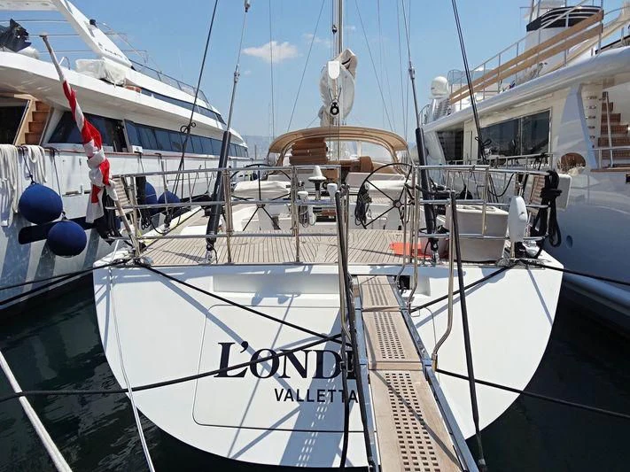 a boat with a white sign aboard L'ONDINE Yacht for Sale