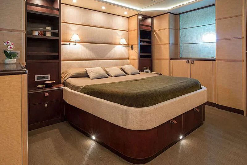 a bed in a room aboard INDIAN Yacht for Sale