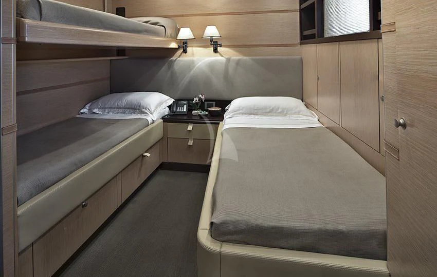a room with two beds aboard INDIAN Yacht for Sale