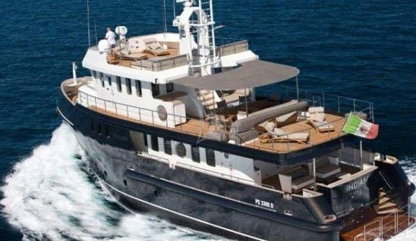 a large ship with smoke coming out of it aboard INDIAN Yacht for Sale
