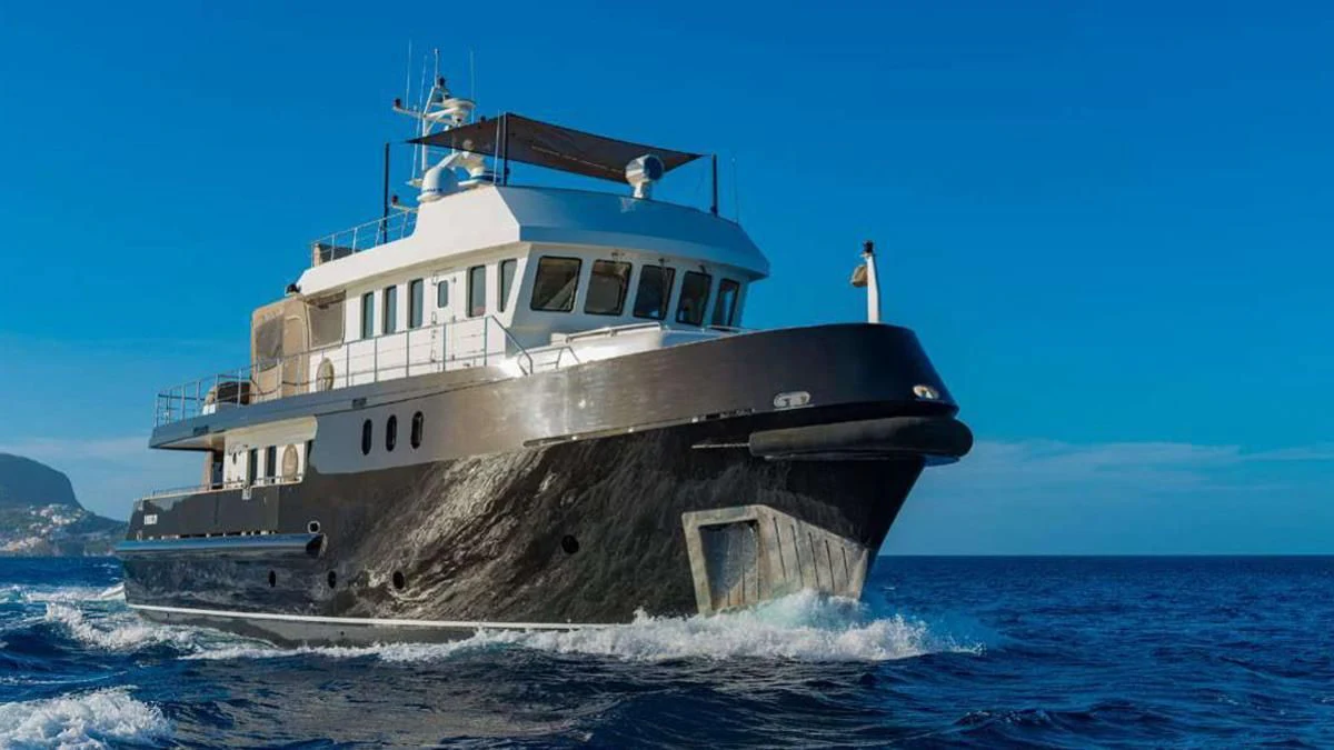 a boat on a rock in the water aboard INDIAN Yacht for Sale