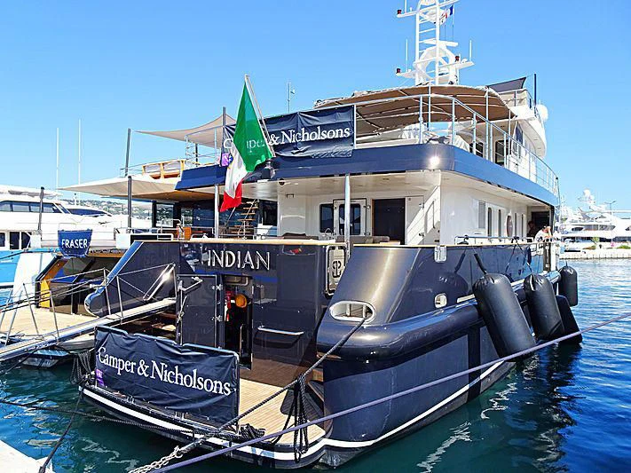 a boat docked at a pier aboard INDIAN Yacht for Sale