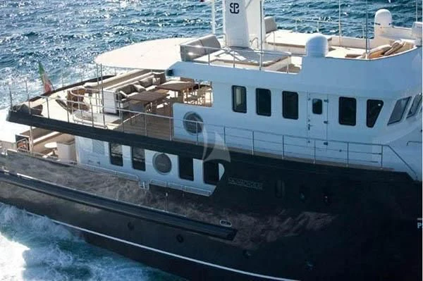 a large white boat on the water aboard INDIAN Yacht for Sale