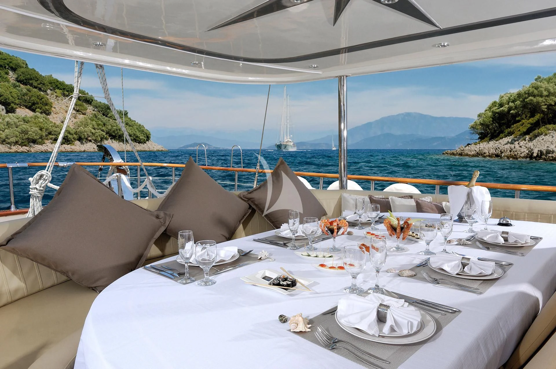 a table set for a dinner aboard ALESSANDRO I Yacht for Sale