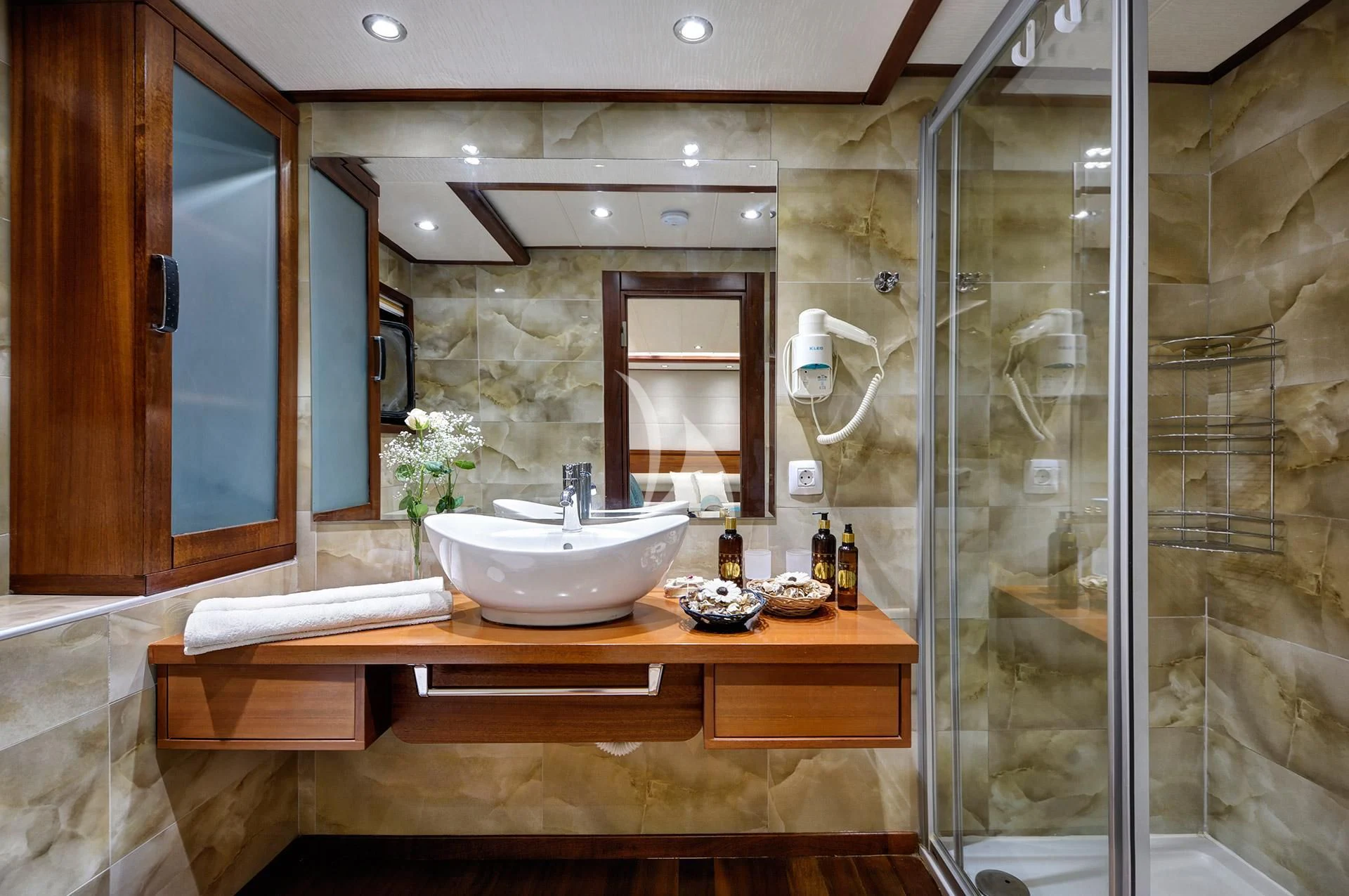 a bathroom with a glass shower aboard ALESSANDRO I Yacht for Sale