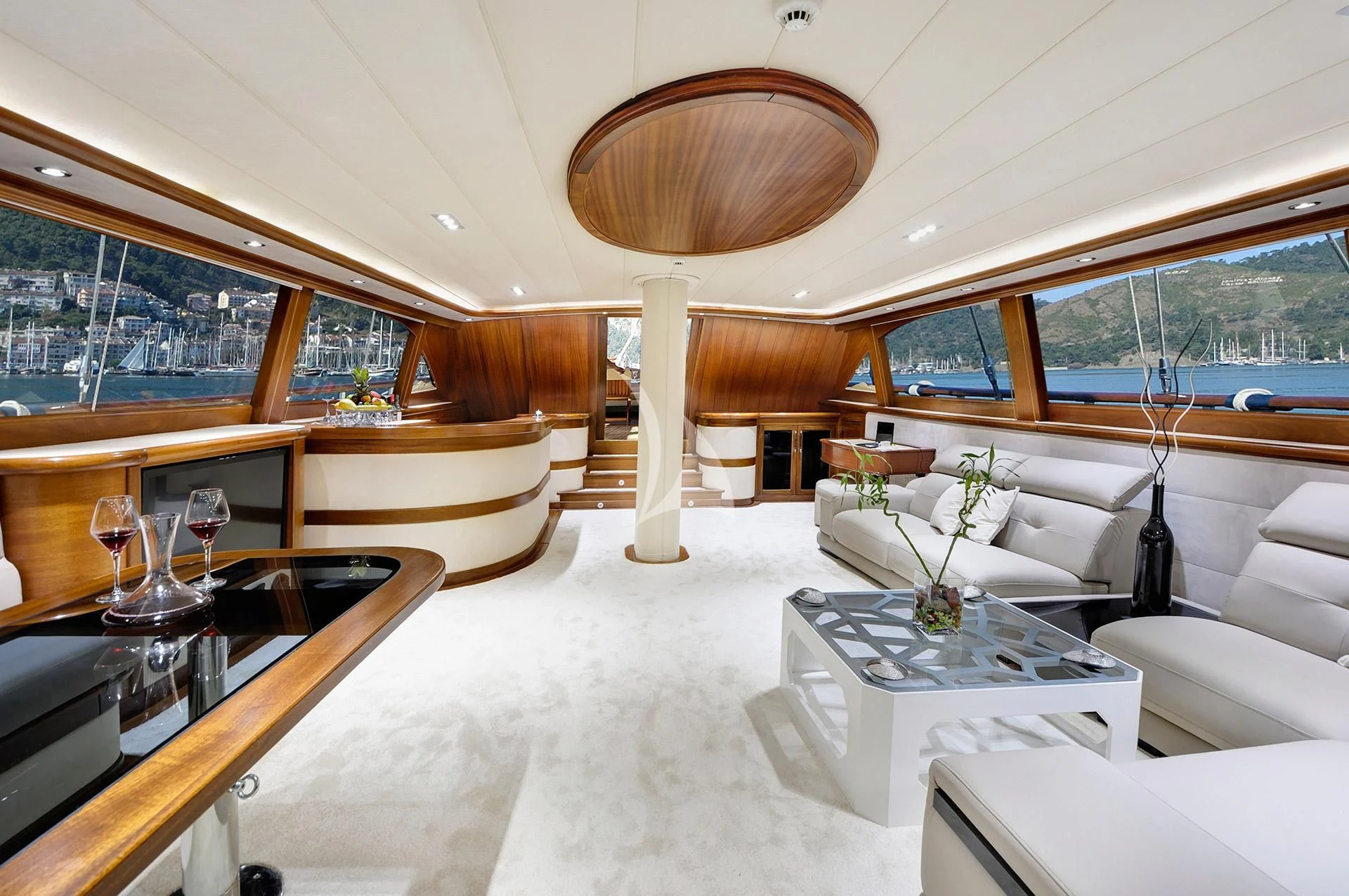 a room with a table and chairs aboard ALESSANDRO I Yacht for Sale