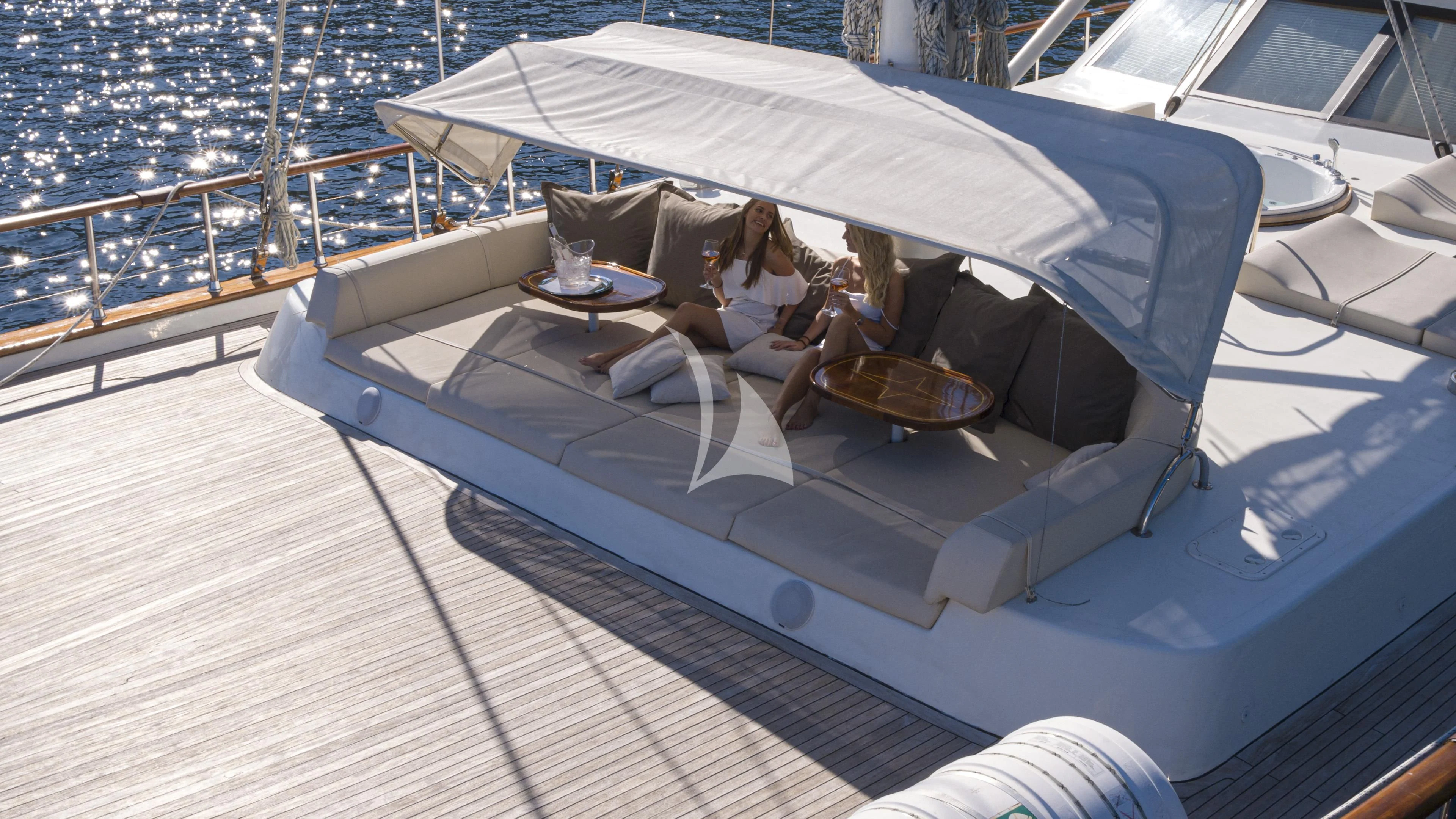 a boat with people sitting on it aboard ALESSANDRO I Yacht for Sale