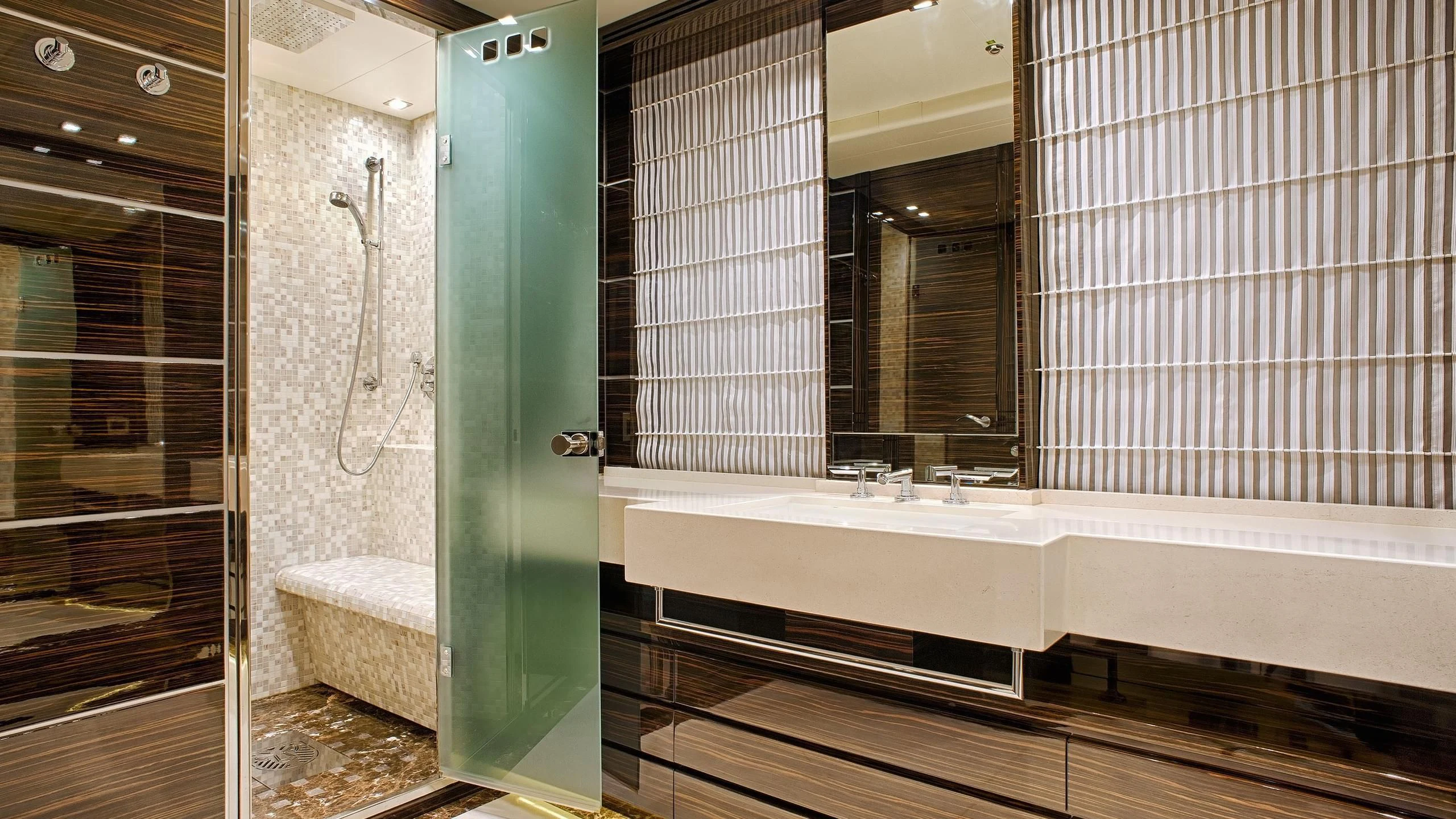 a bathroom with a tub and shower aboard TUTTO LE MARRANE Yacht for Charter
