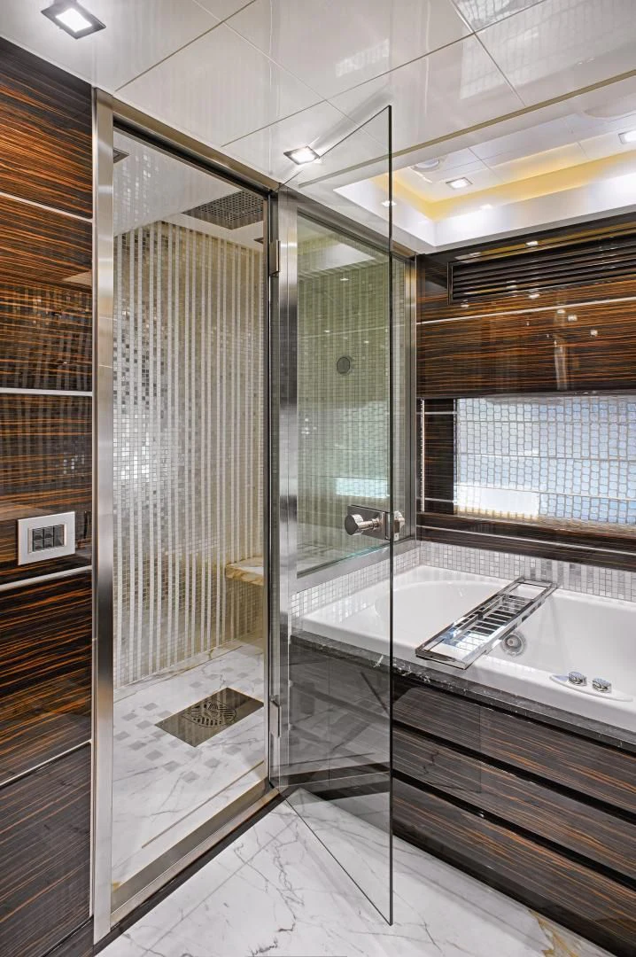 a bathroom with a shower unit aboard TUTTO LE MARRANE Yacht for Charter