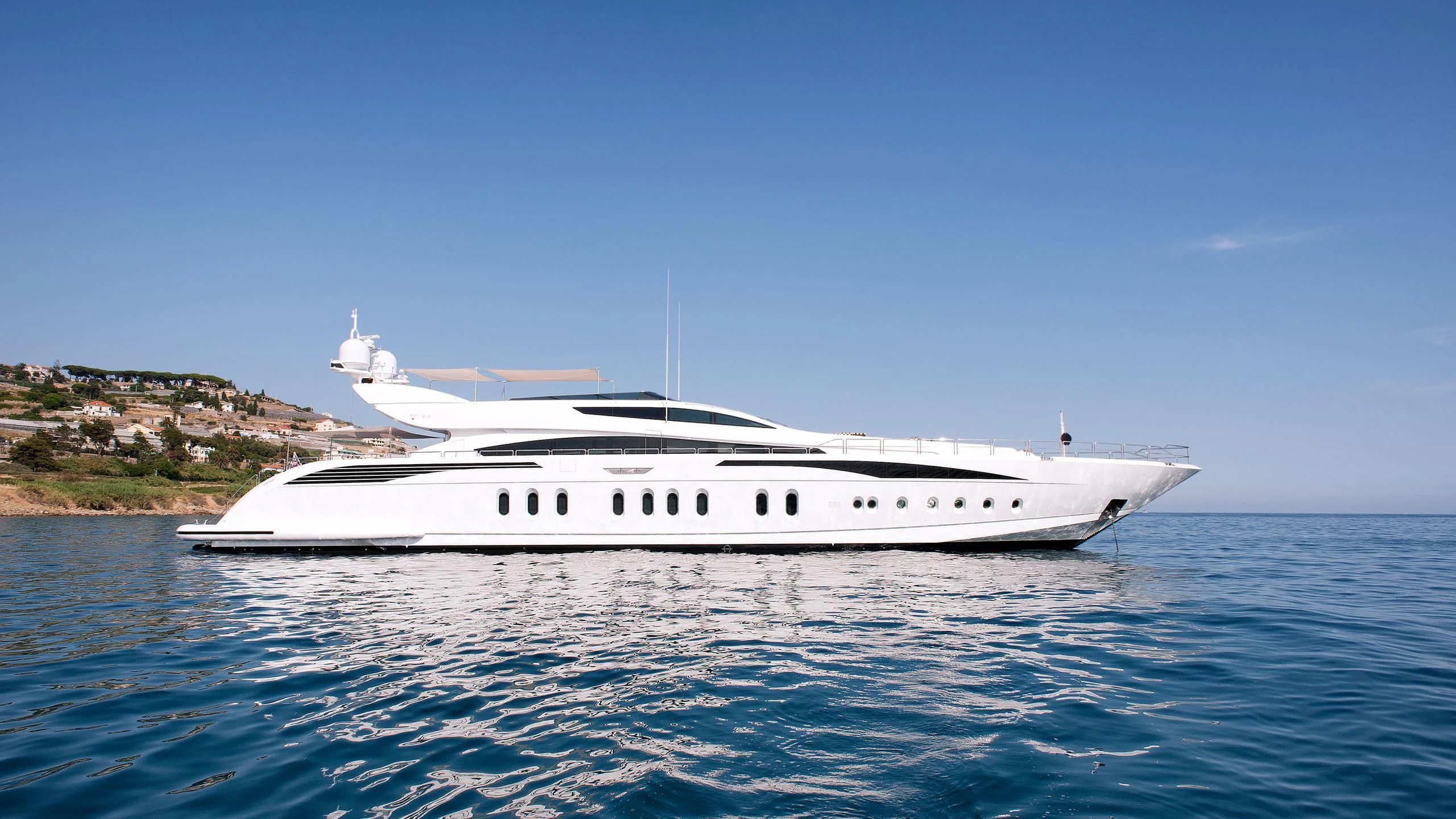 a white yacht in the water aboard TUTTO LE MARRANE Yacht for Charter
