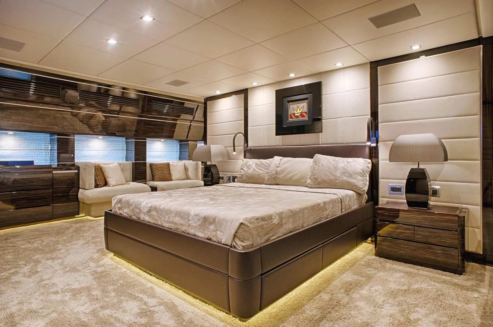 a large bed in a room aboard TUTTO LE MARRANE Yacht for Charter