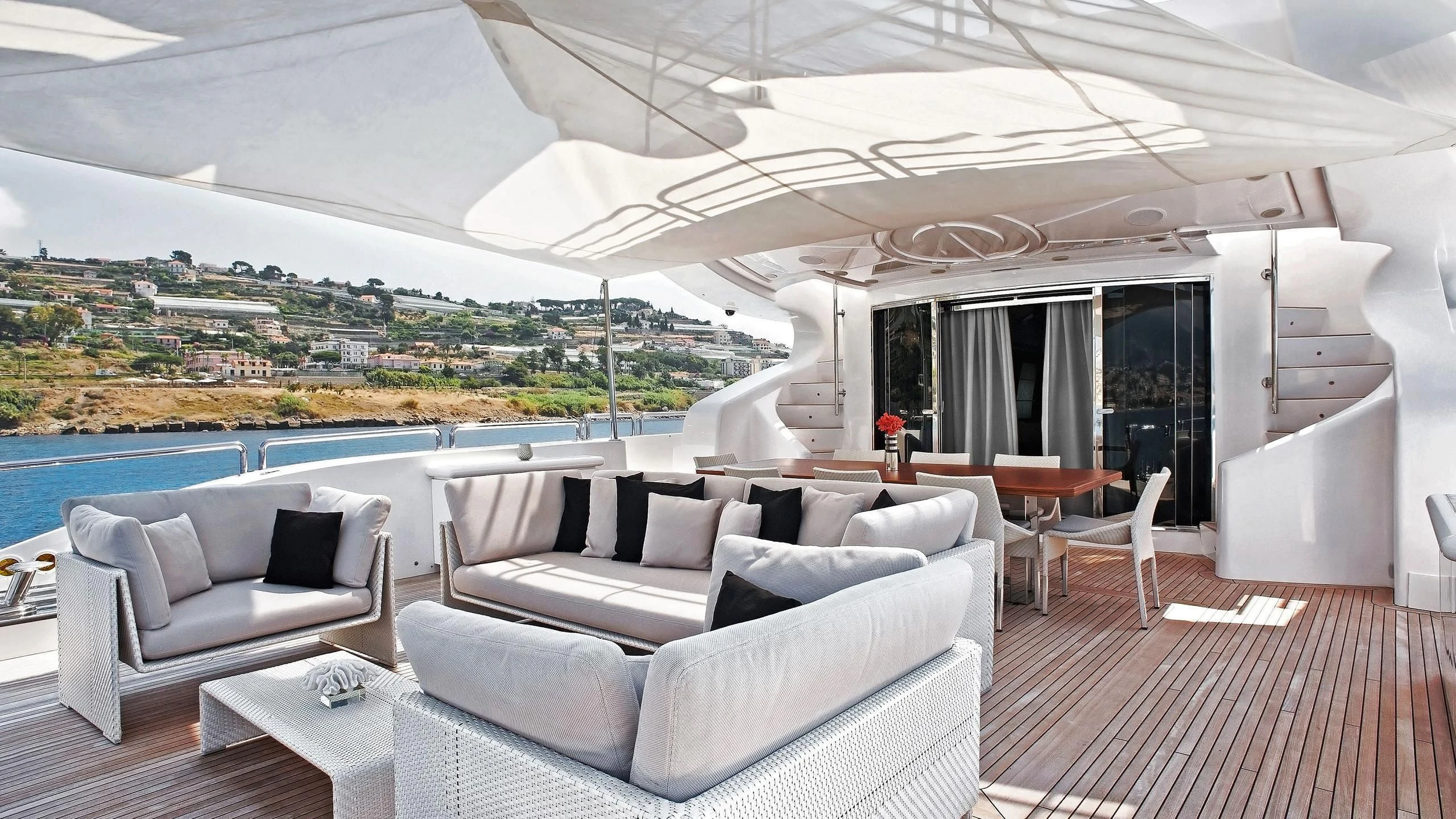 a room with a couch and a table and chairs aboard TUTTO LE MARRANE Yacht for Charter