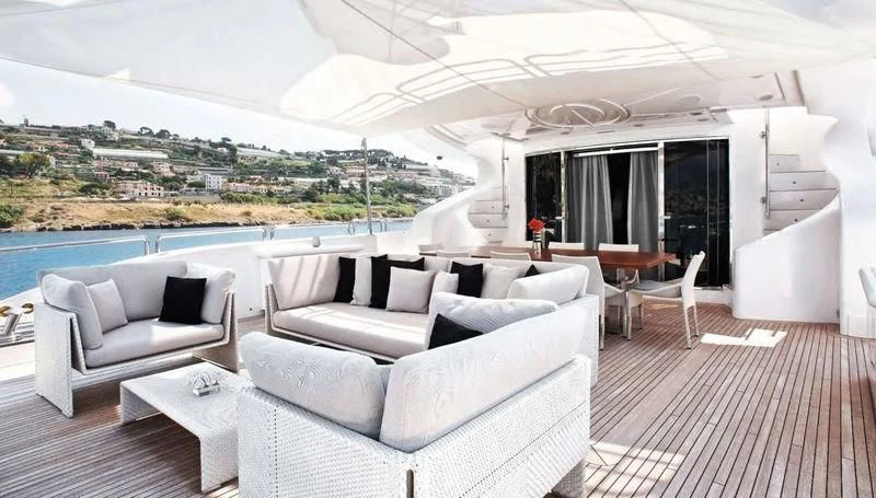 a living room with a large window aboard TUTTO LE MARRANE Yacht for Charter