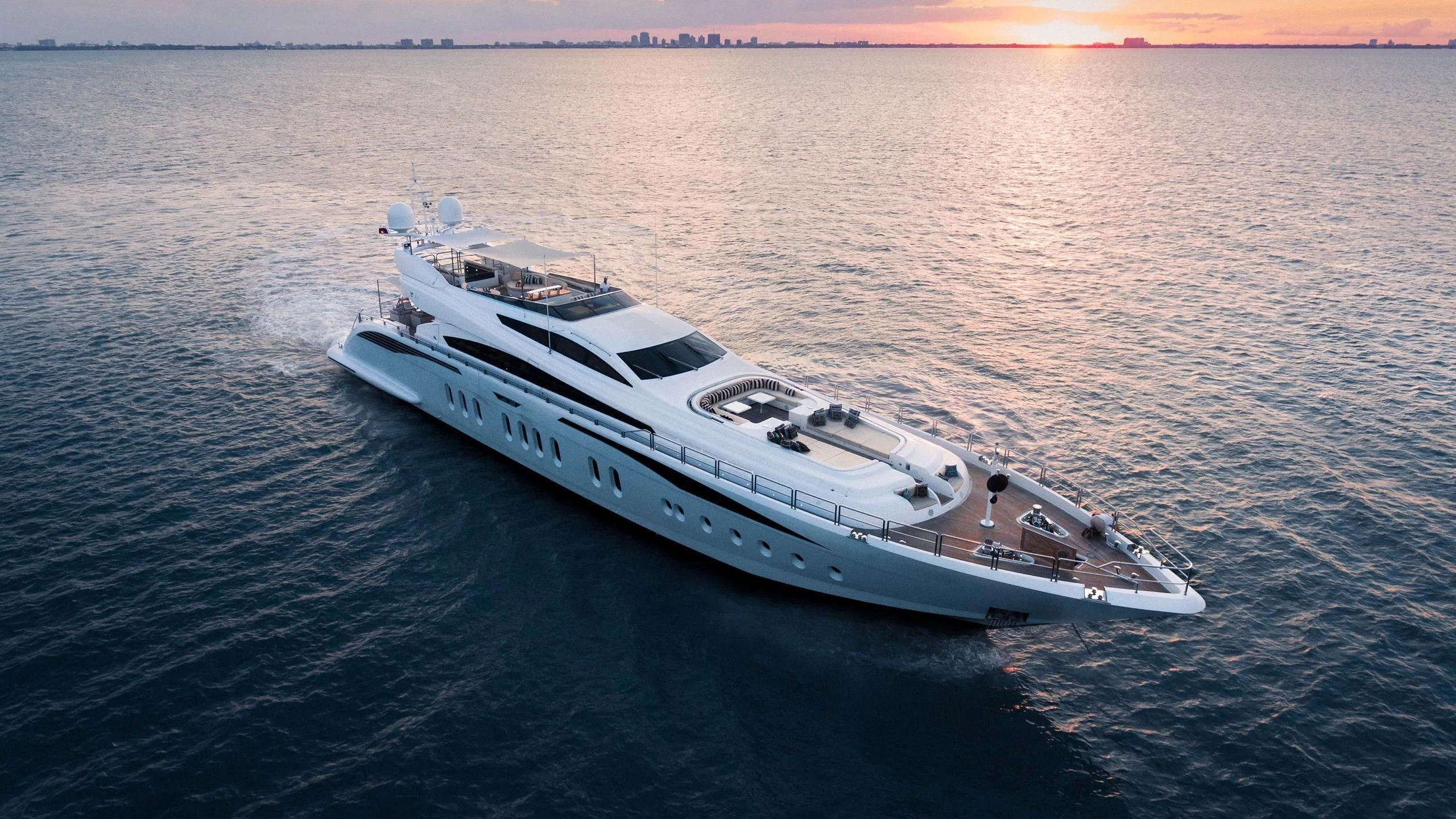 a white yacht in the water aboard TUTTO LE MARRANE Yacht for Charter
