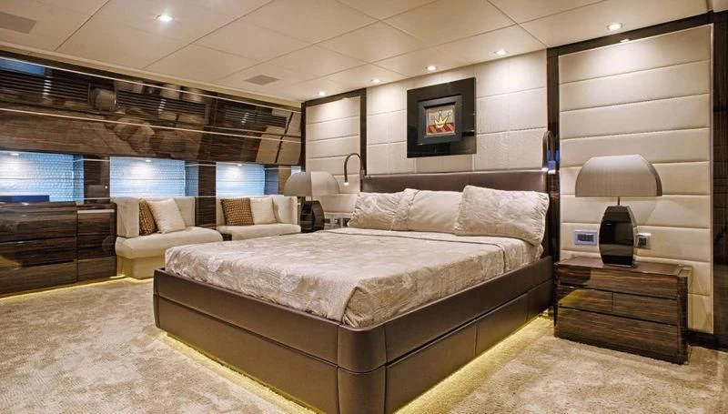 a large bed in a room aboard TUTTO LE MARRANE Yacht for Charter