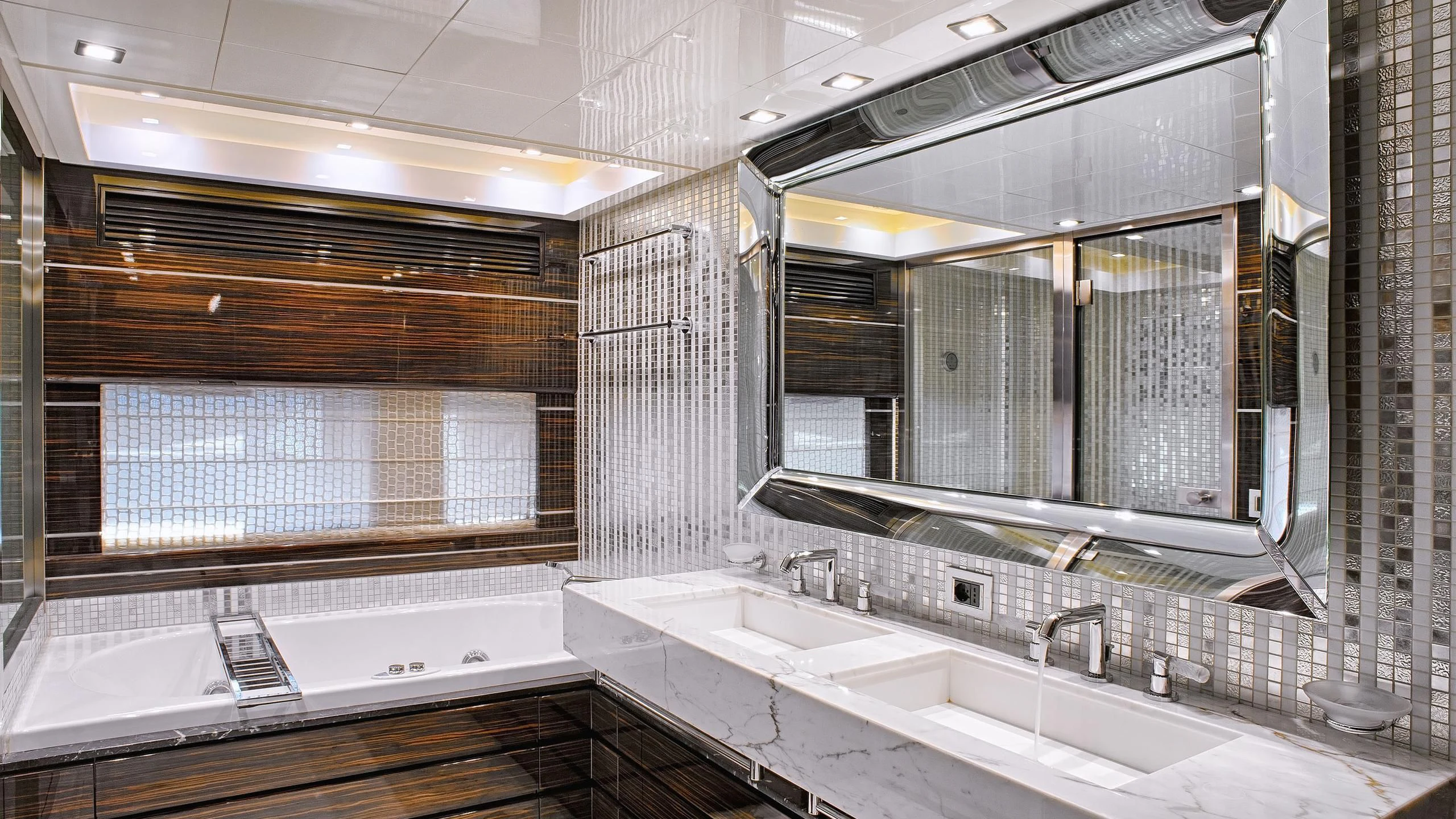 a bathroom with a large mirror aboard TUTTO LE MARRANE Yacht for Charter