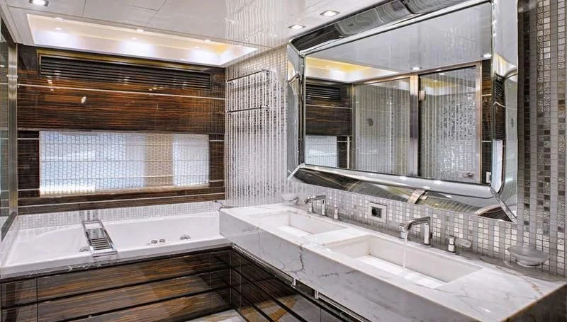 a bathroom with sinks and mirrors aboard TUTTO LE MARRANE Yacht for Charter
