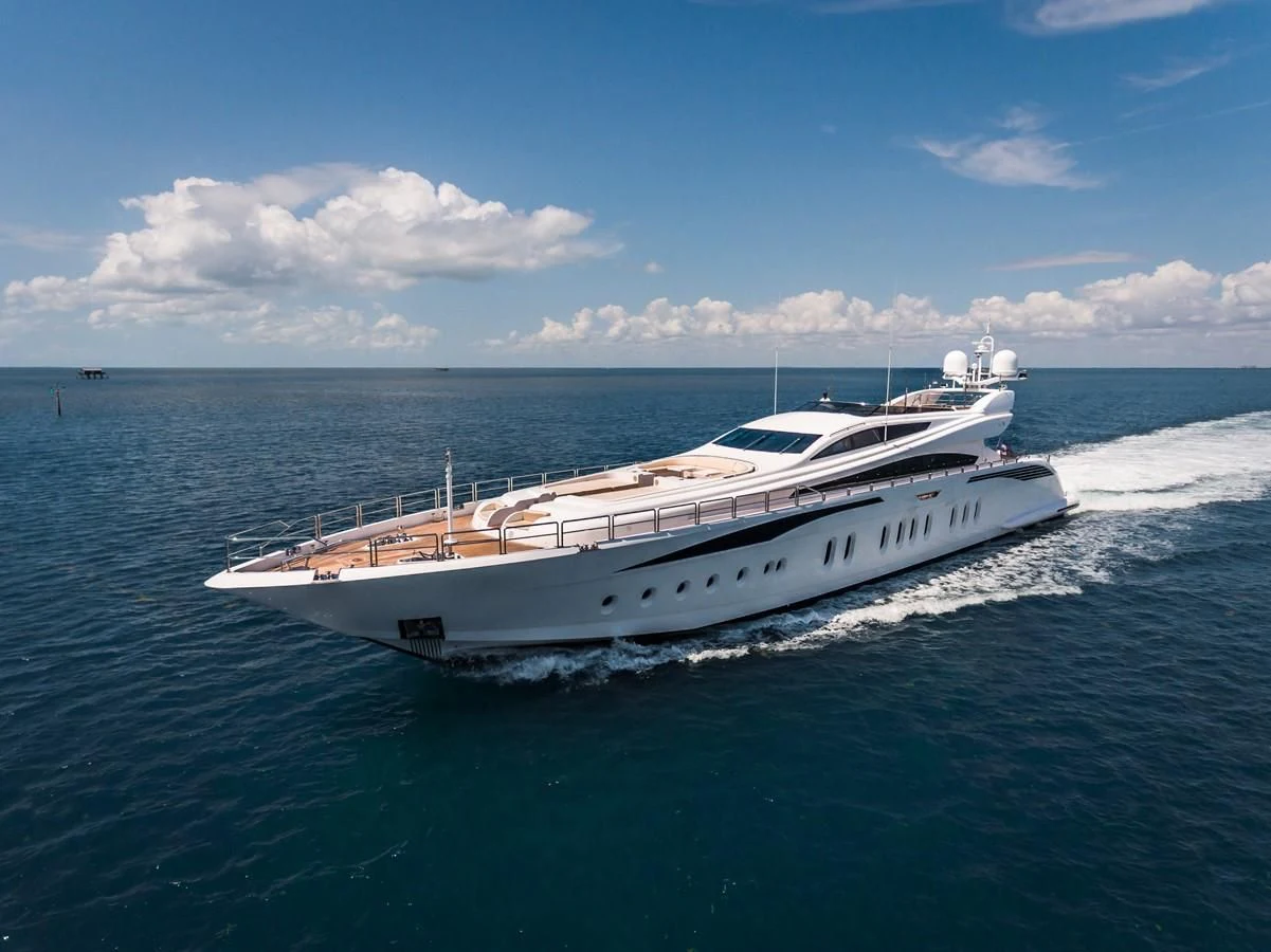 a white boat in the water aboard TUTTO LE MARRANE Yacht for Charter
