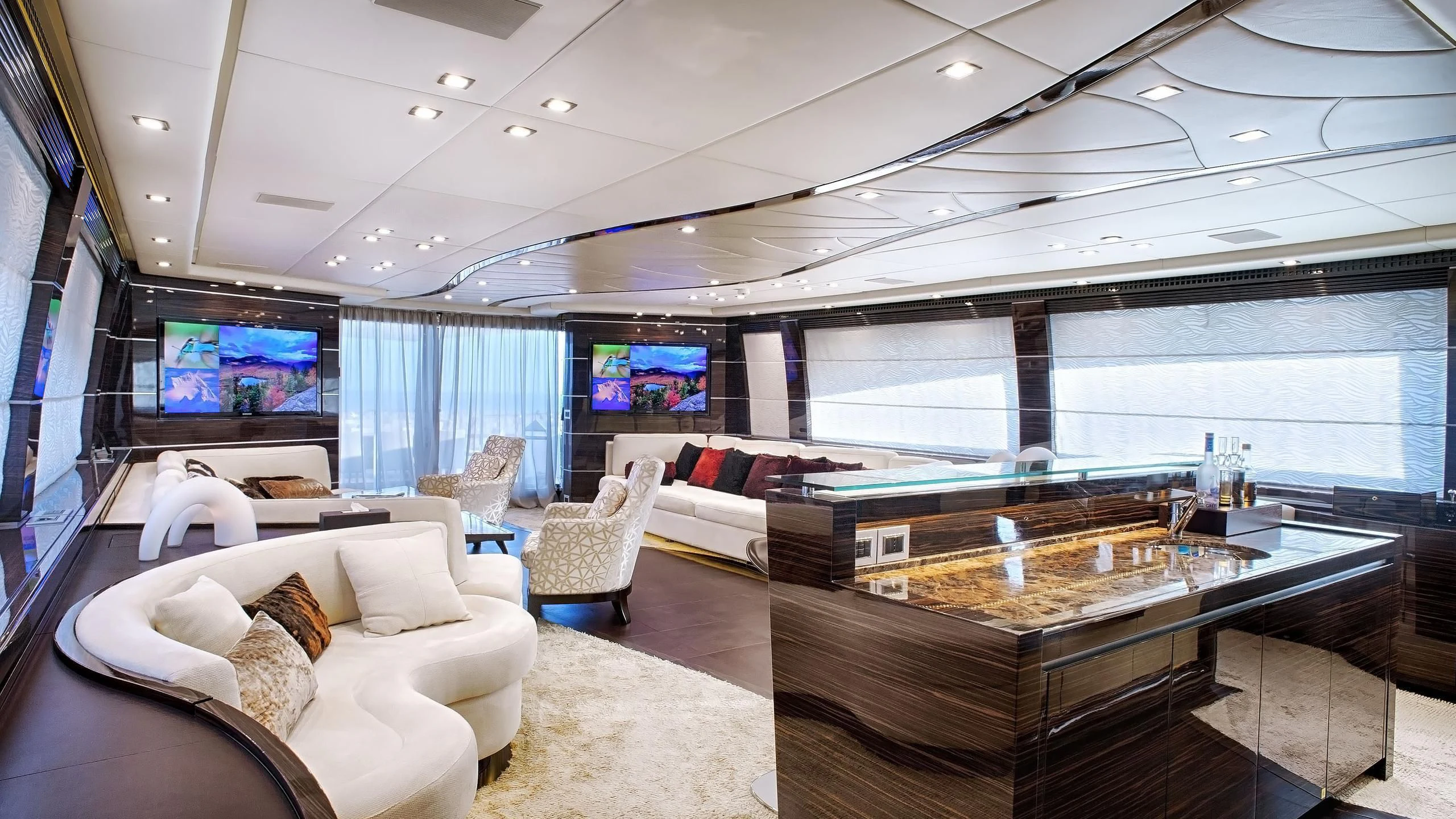a room with a large glass window aboard TUTTO LE MARRANE Yacht for Charter