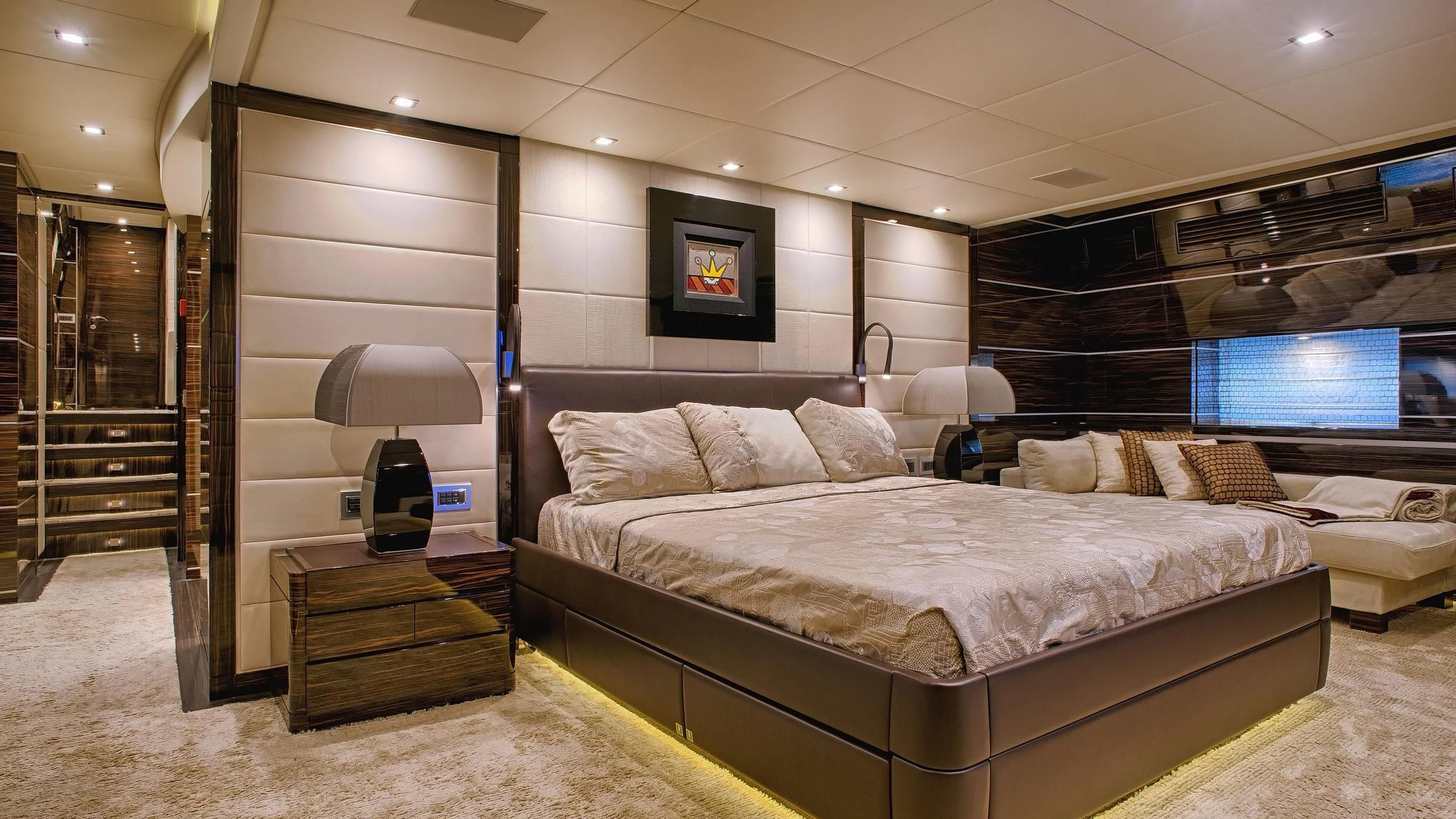 a large bedroom with a large bed aboard TUTTO LE MARRANE Yacht for Charter