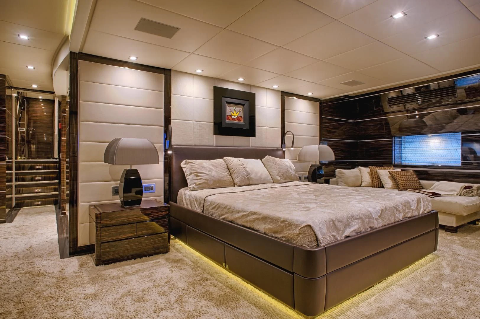 a large bed in a room aboard TUTTO LE MARRANE Yacht for Charter