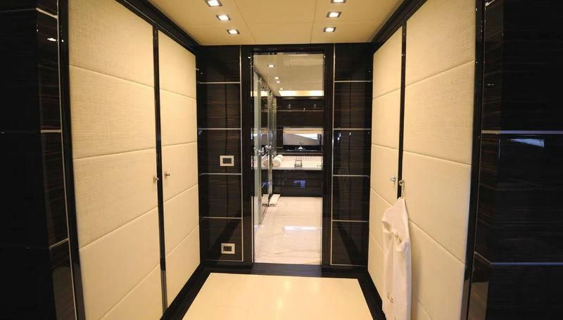 a room with a large mirror aboard TUTTO LE MARRANE Yacht for Charter