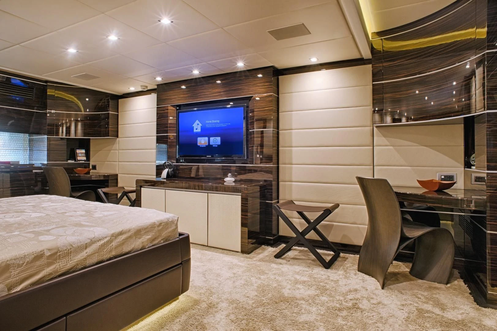 a bedroom with a tv aboard TUTTO LE MARRANE Yacht for Charter