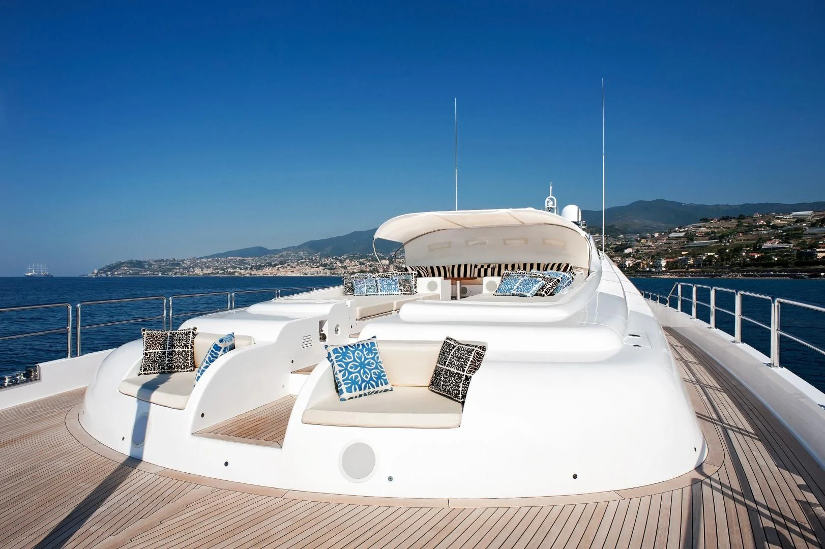 a white boat on a deck aboard TUTTO LE MARRANE Yacht for Charter