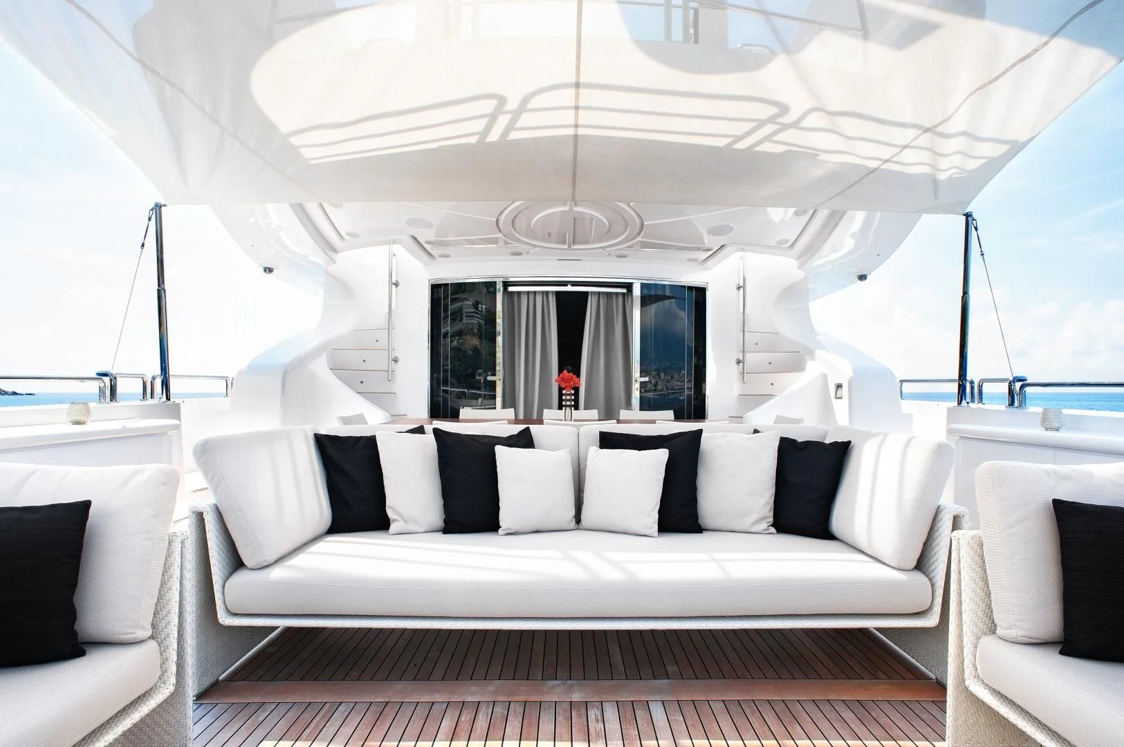 a white couch in a room aboard TUTTO LE MARRANE Yacht for Charter