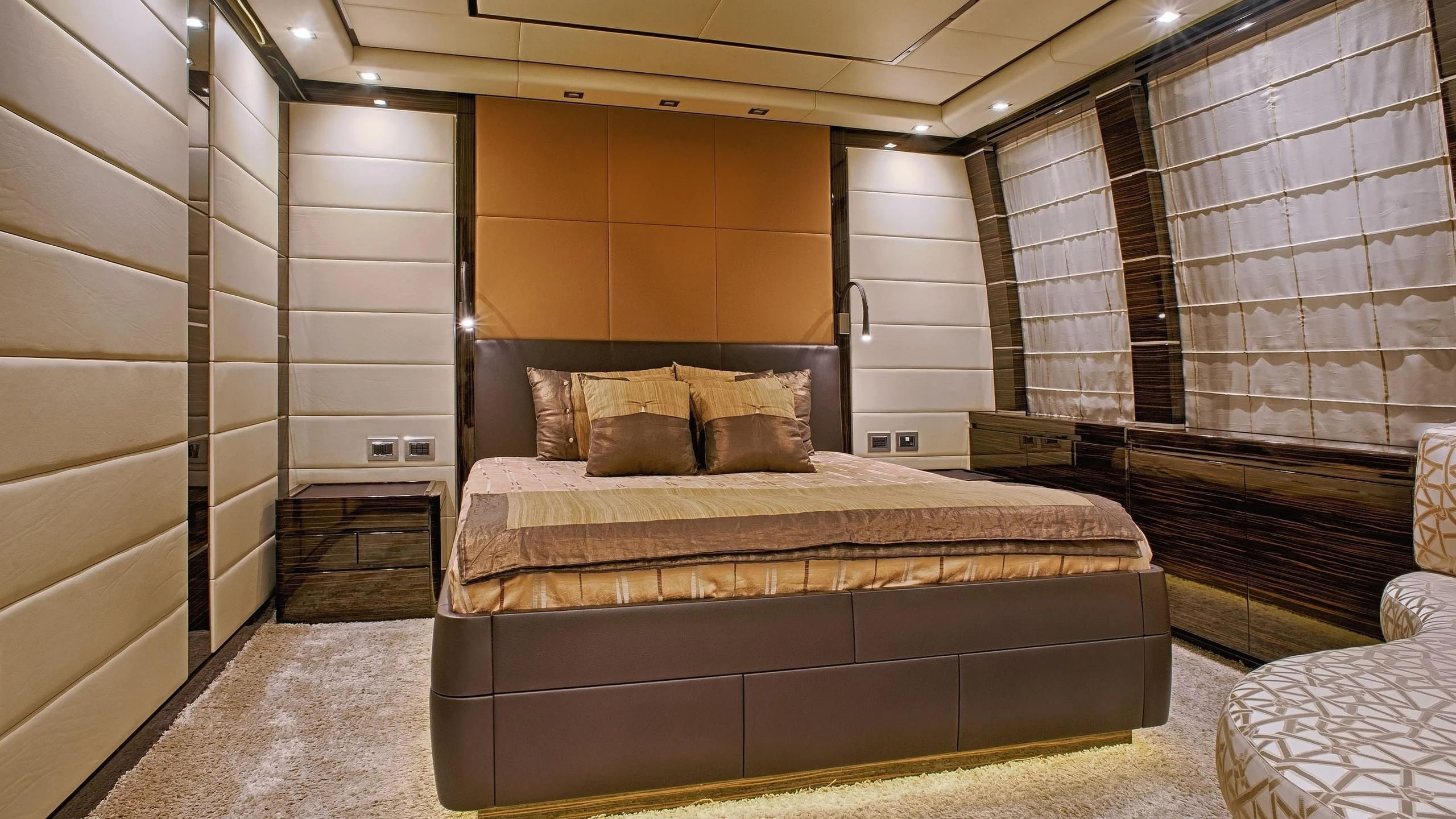 a large bed in a room aboard TUTTO LE MARRANE Yacht for Charter