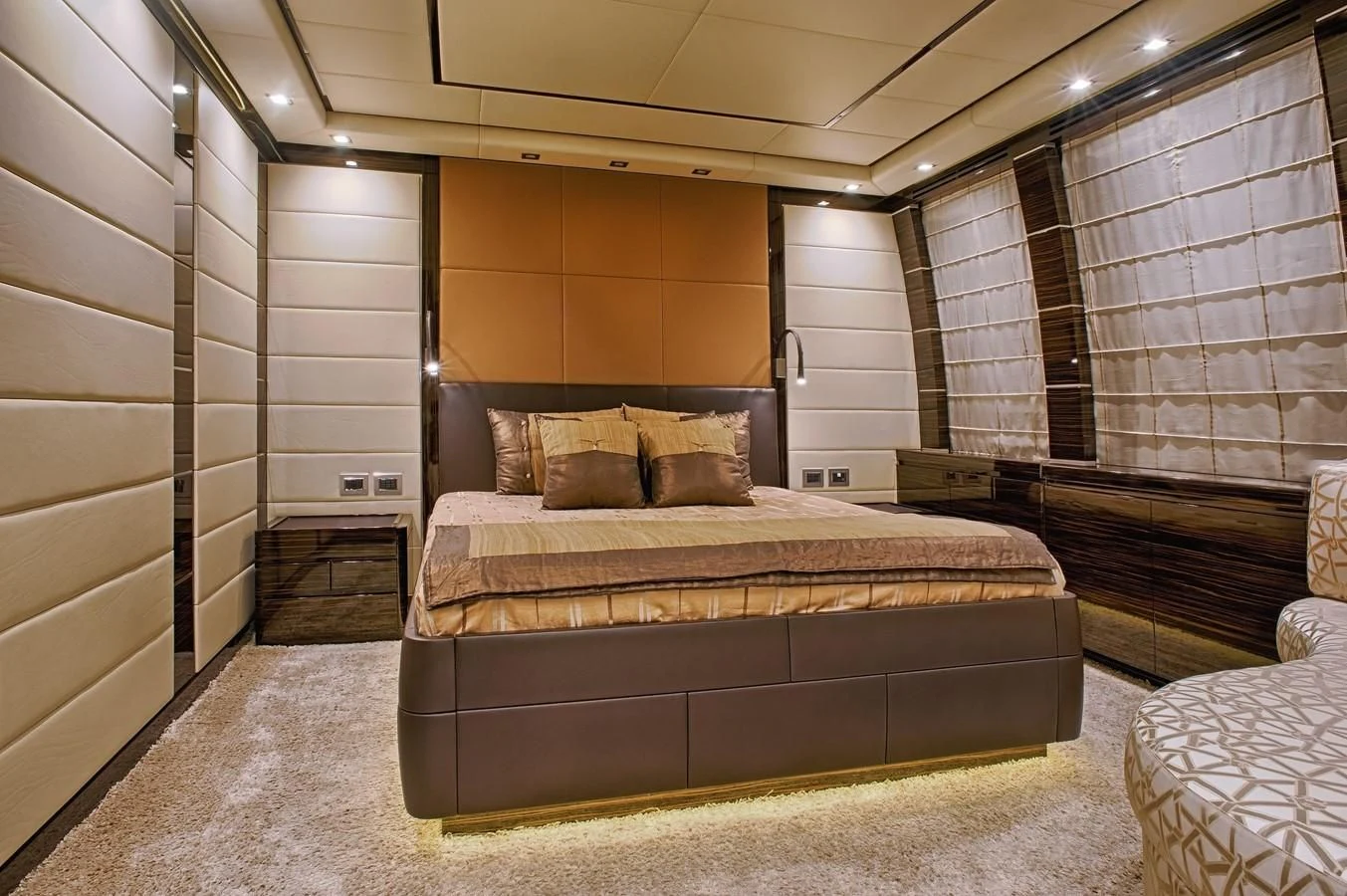 a large bed in a room aboard TUTTO LE MARRANE Yacht for Charter