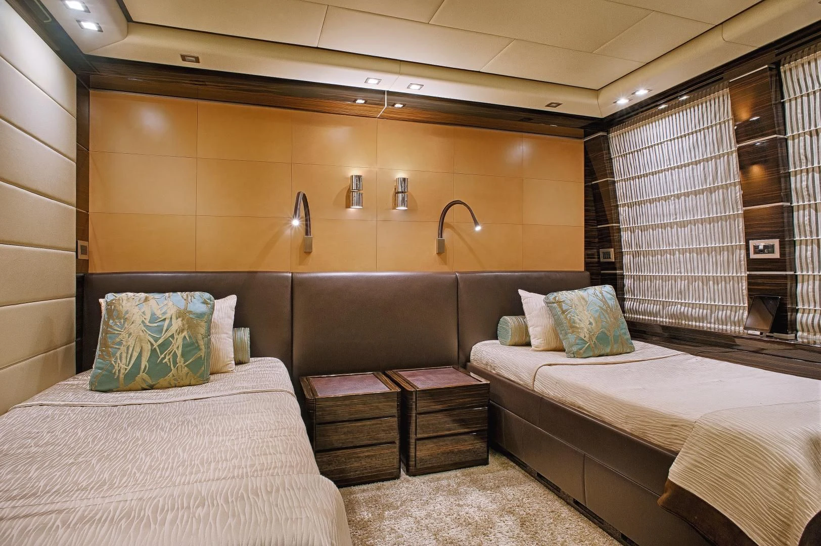 a room with two beds aboard TUTTO LE MARRANE Yacht for Charter