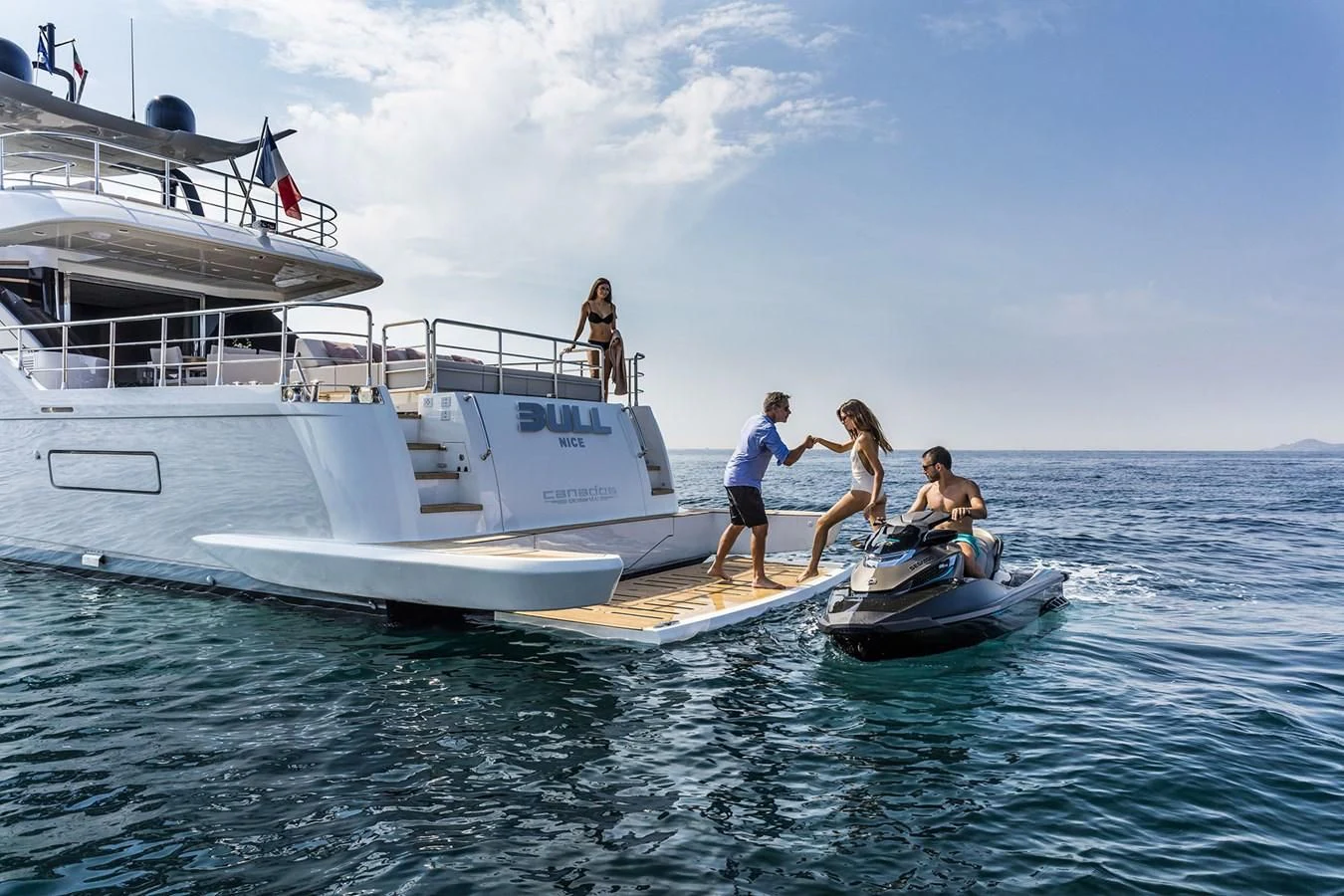 a group of people on a boat aboard BULL Yacht for Sale