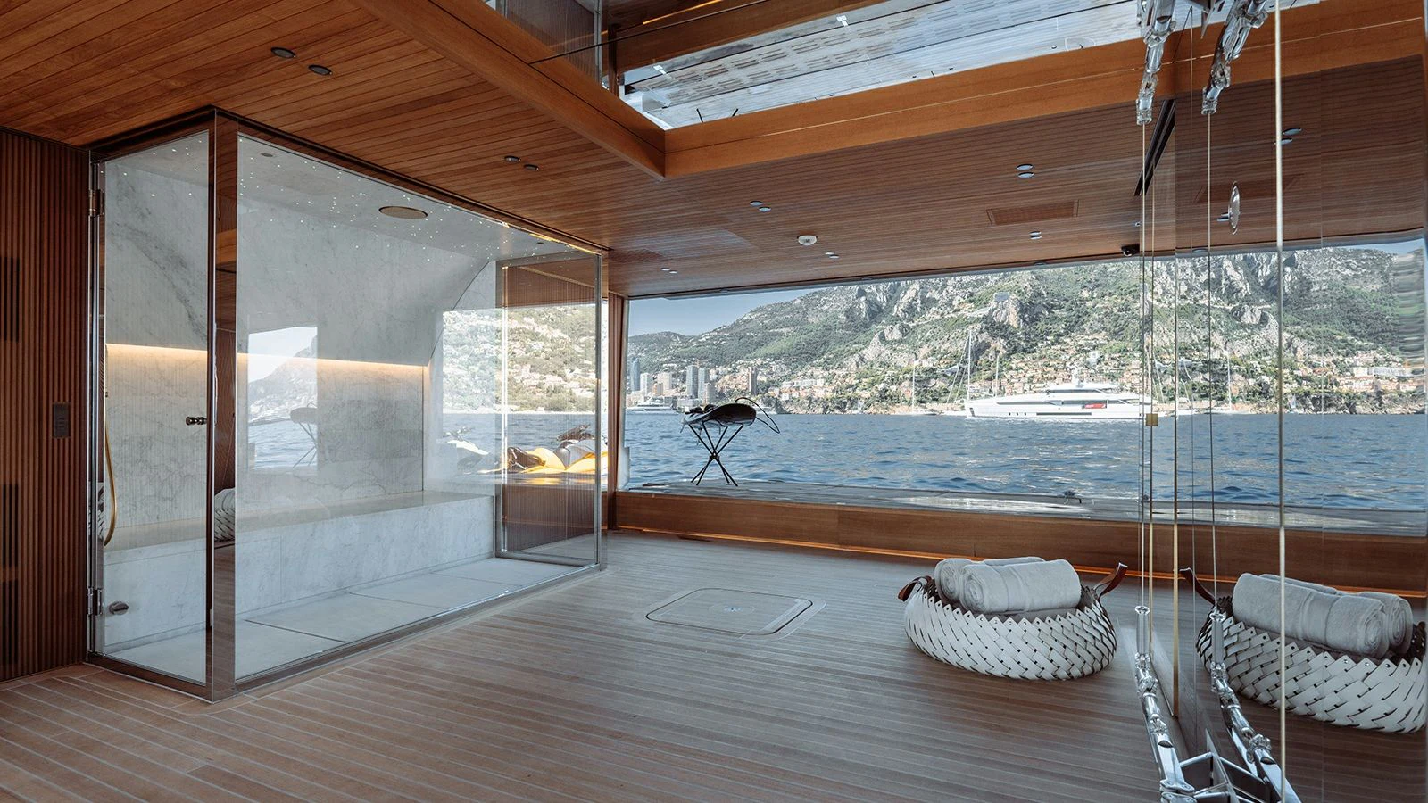 a room with a large glass door aboard LA LA LAND Yacht for Charter