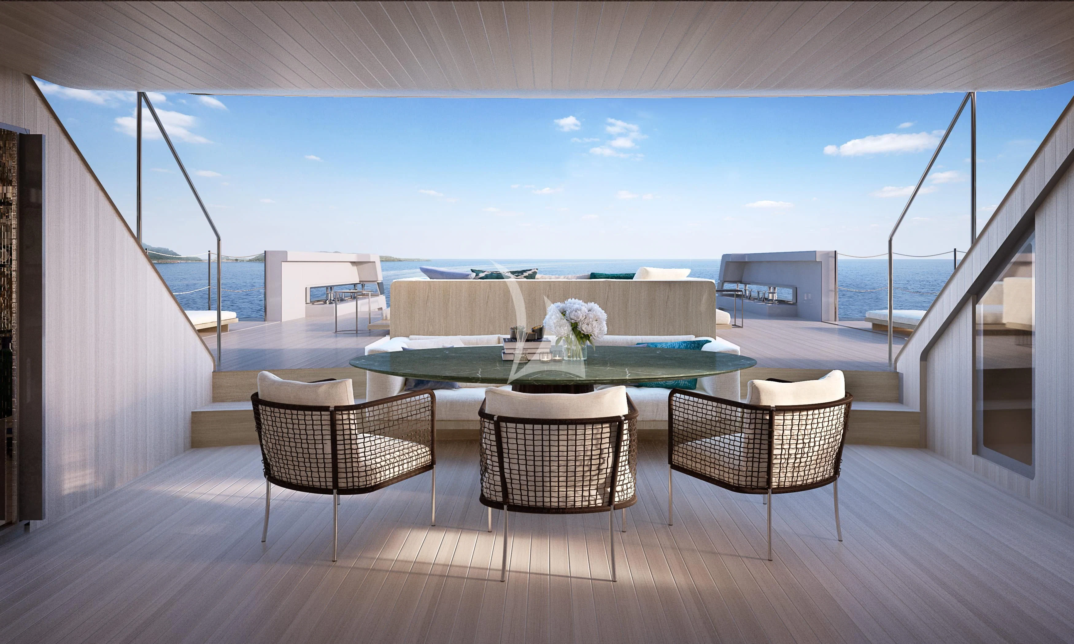 a table and chairs on a deck aboard LA LA LAND Yacht for Charter