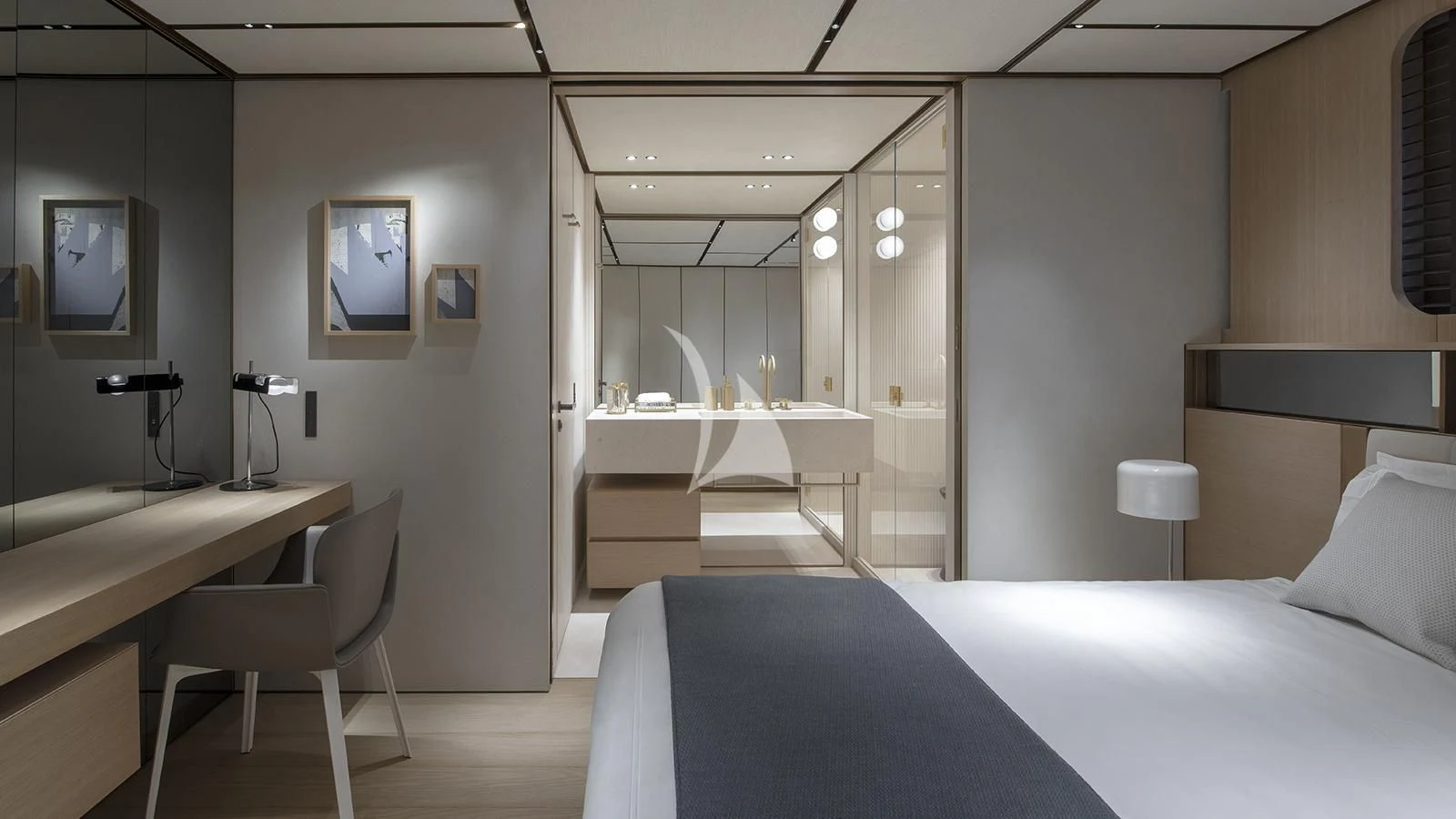 a room with a bed and a desk aboard LA LA LAND Yacht for Charter