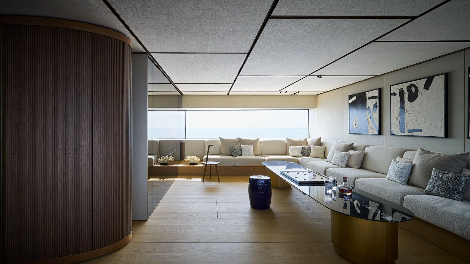 a living room with a couch and a coffee table aboard LA LA LAND Yacht for Charter