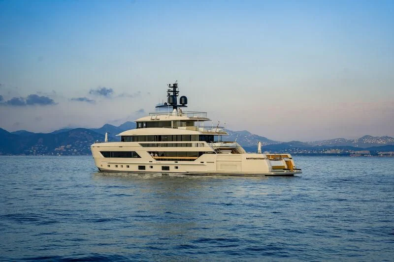 a large white boat in the water aboard LA LA LAND Yacht for Charter