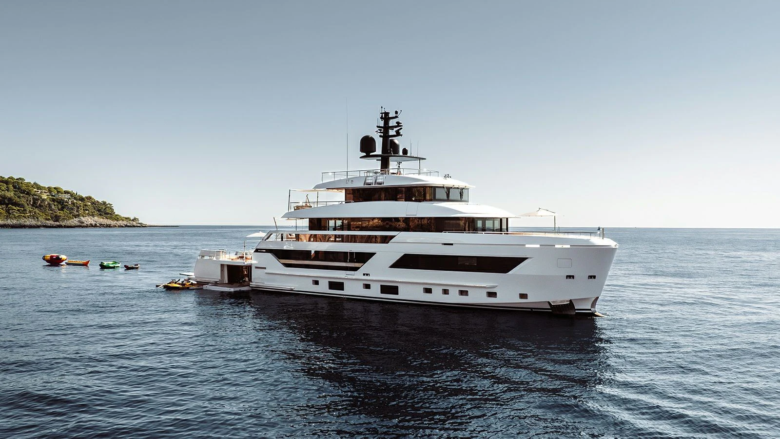a large white boat in the water aboard LA LA LAND Yacht for Charter