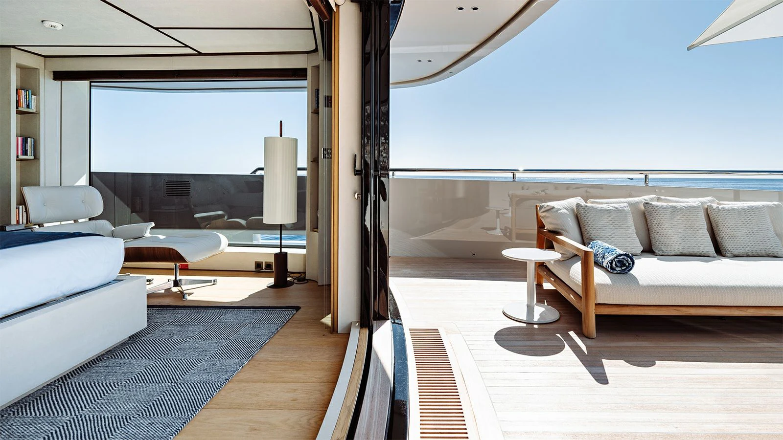 a living room with a large window aboard LA LA LAND Yacht for Charter