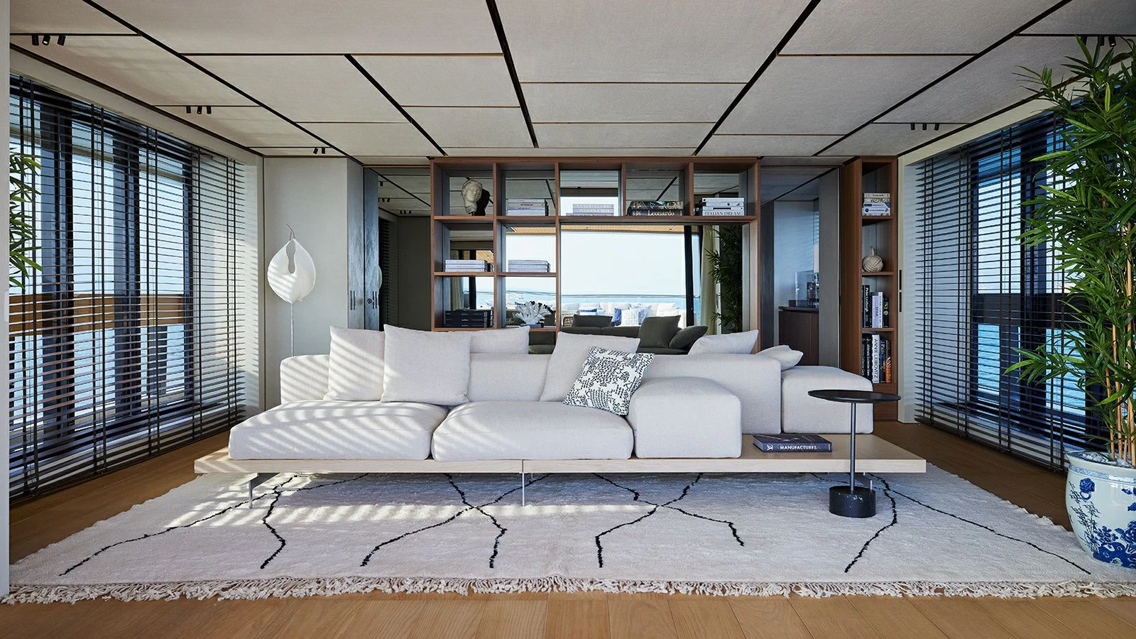 a white couch in a room aboard LA LA LAND Yacht for Charter