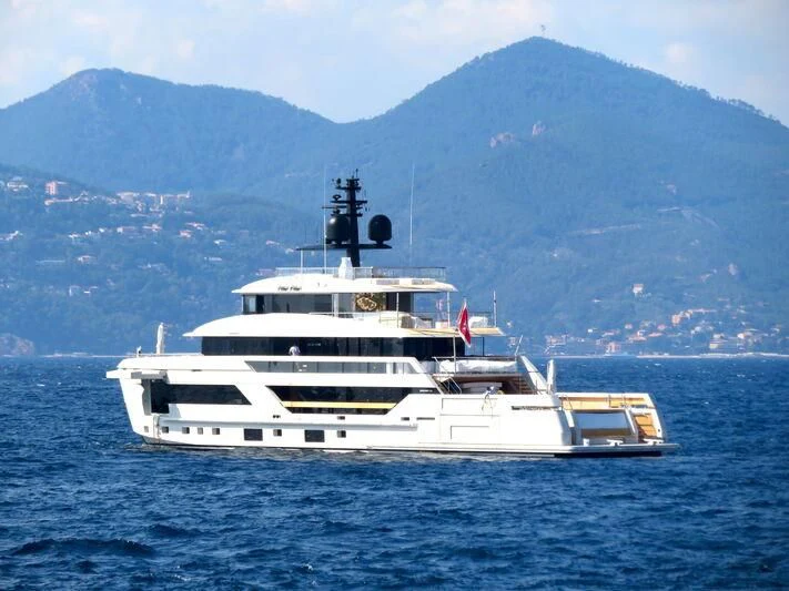 a white boat in the water aboard LA LA LAND Yacht for Charter