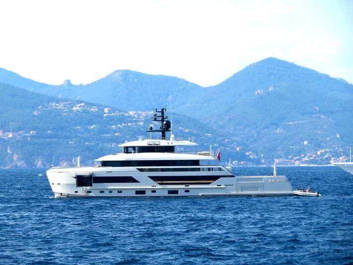 a white yacht in the water aboard LA LA LAND Yacht for Charter