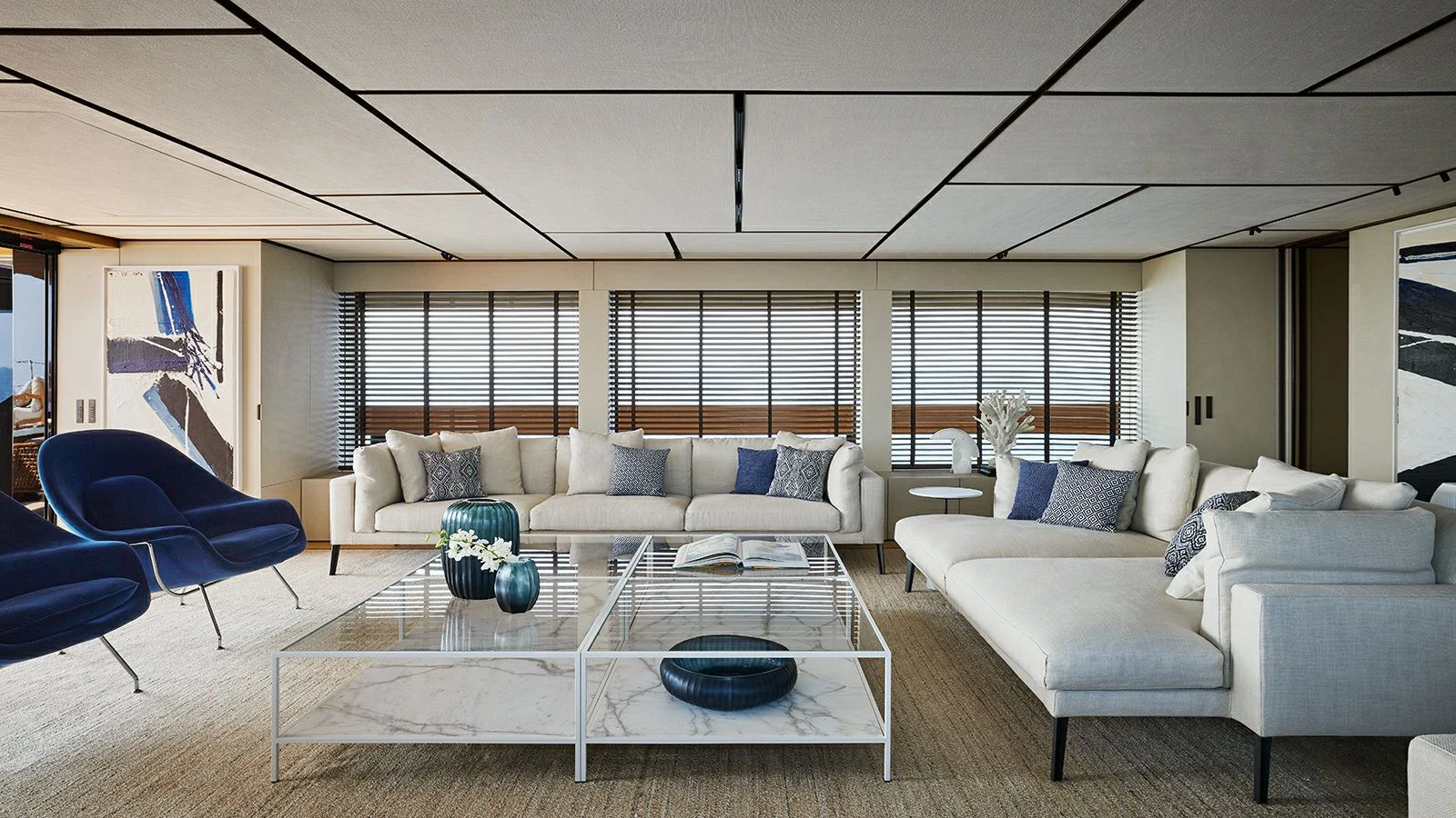 a living room with a couch and a table aboard LA LA LAND Yacht for Charter