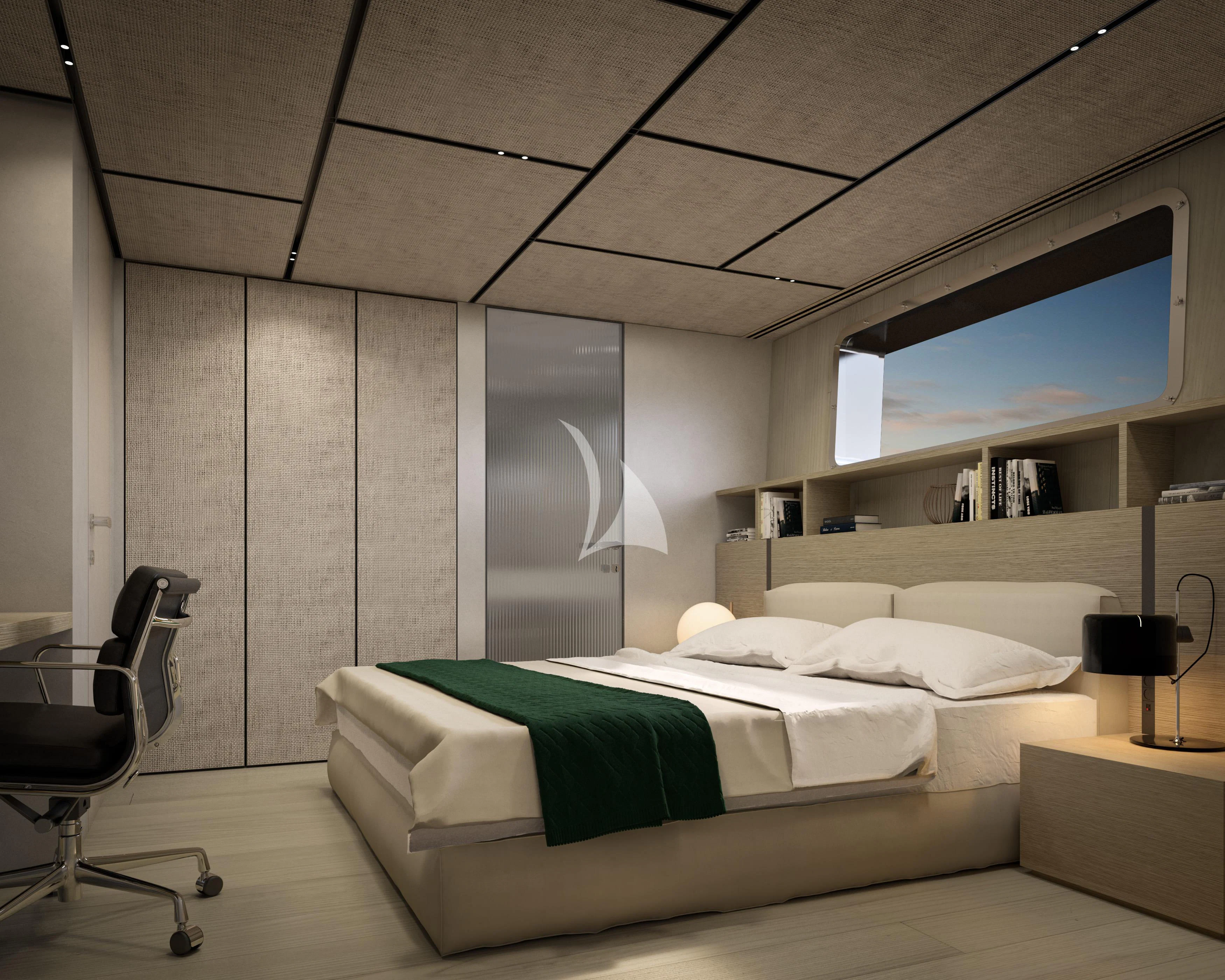 a room with a bed and a chair aboard LA LA LAND Yacht for Charter