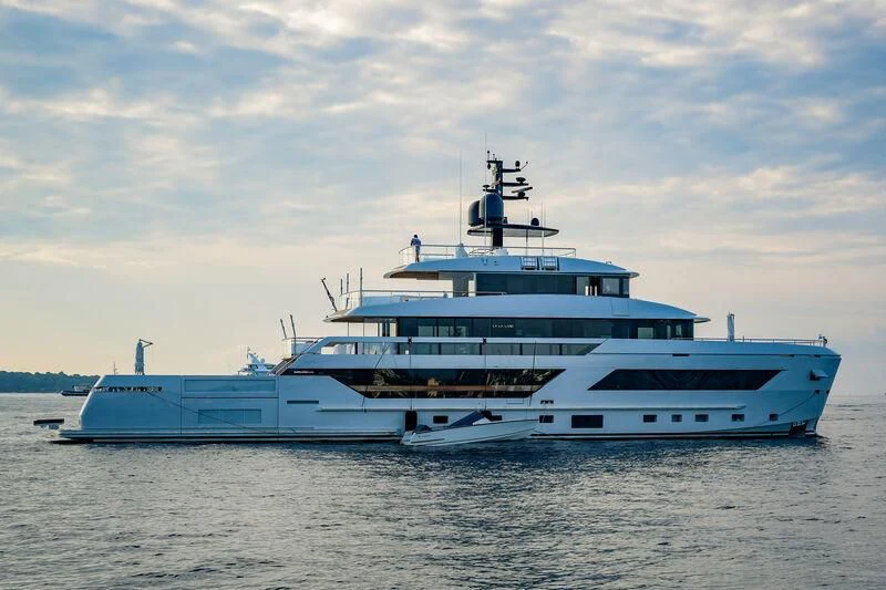 a large white boat in the water aboard LA LA LAND Yacht for Charter